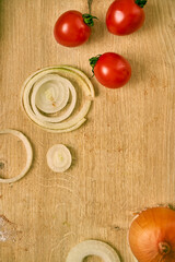 Fresh spinach leaves on a wooden cutting board