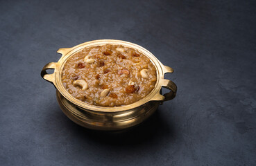 Onam and Vishu special Payasam in a golden bowl, Ari Payasam arranged in brass vessel