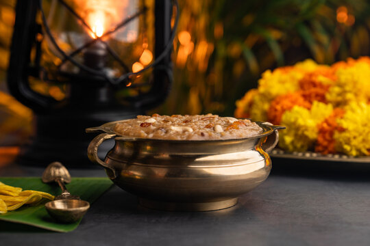 Temple payasam in golden vessel, Onam Vishu and Diwali festival special sweet dessert sharkara payasam