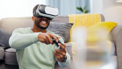 Vr, gaming Indian man in virtual reality in home on sofa in living room, laughing and having fun. 3d metaverse, esports gamer and happy young male playing futuristic games with controller © Wesley JvR/peopleimages.com