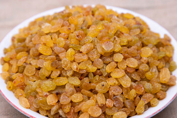 A Bowl of Delicious sweet raisins. Selective Focus