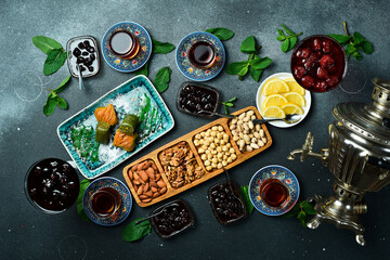 Tea ceremony. Azerbaijani traditional serving of tea. Tea, dried fruits and nuts. Top view.