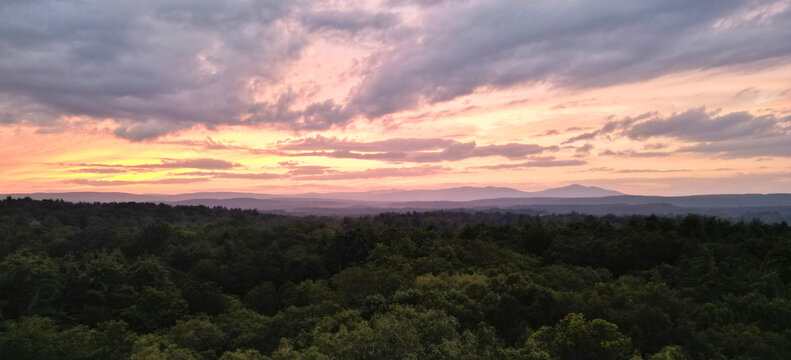 view of catskill mountains at sunset (catskills, new york state, drone image of hills and trees) landscape, nature, blue sunrise