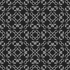Black and white  pattern . Figures ornament.Seamless pattern for fashion, textile design,  on wall paper, wrapping paper, fabrics and home decor.