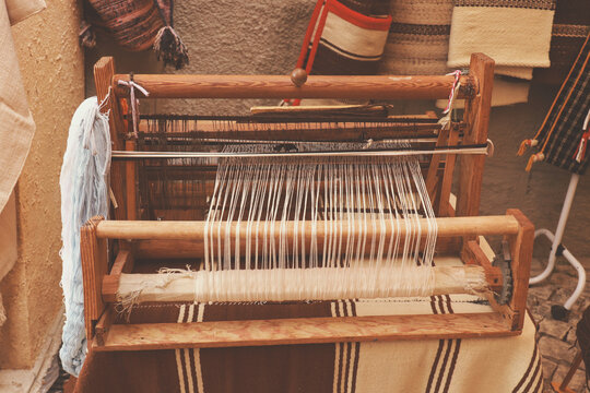 A closeup image of an old weaving Loom in a street market