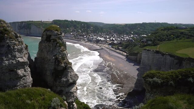 Etretat view. beautiful beach in famous france place. Village on ocean. summertime at daylight. High quality 4k footage