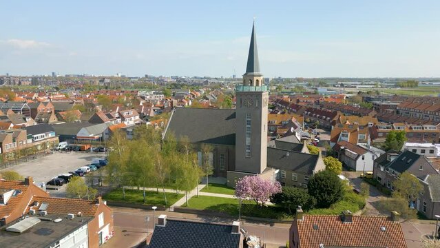 Aerial drone video of the church tower in Valkenburg, the Netherlands