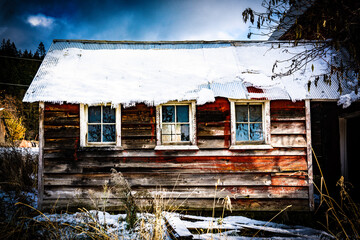 abandoned barn in the snow