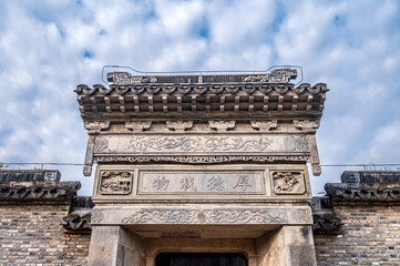 Chinese traditional folk building gate stone carving decorative pattern close-up