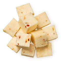 Cubes of halloumi cheese with red chilli isolated on white from above.