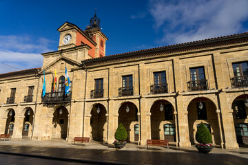 Fototapeta na wymiar City Hall in the Spain square in the old town of the beautiful city of Aviles with its historic buildings with arcades, Asturias, Spain.