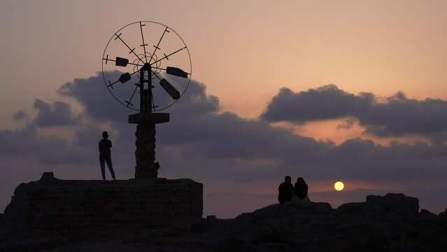 Windmill in a salt production site in the sunset Tripoli Lebanon