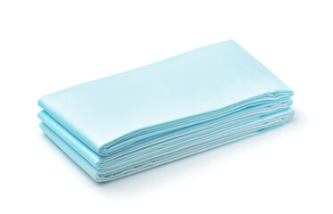 Stack of blue disposable non woven bed sheets