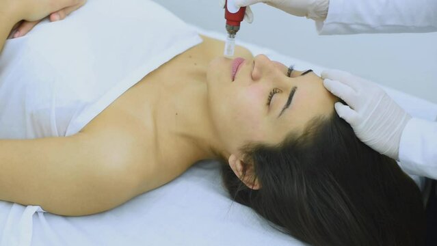 beauty and cosmetology treatment in an aesthetic center with the dermapen technique for the health and aesthetics of the body and skin