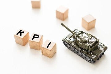 lined with kpi on yellow background. Military armored tank. war activities. Conflict between Russia and Ukraine. Flat lay Copy space Protest against military action. Peace on earth. Place for test