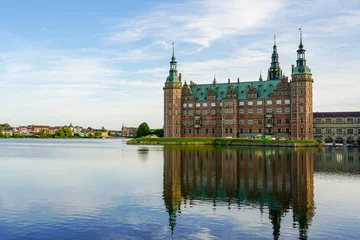 Tuinposter Frederiksborg castle in Hillerod, lakeside facade, beautiful facade reflection in lake water © Zigmunds
