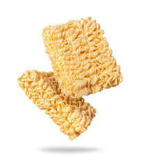 Two cubes of instant dry noodles isolated on white background