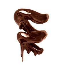 Chocolate in a twisted shape with dripping drops isolated on white background