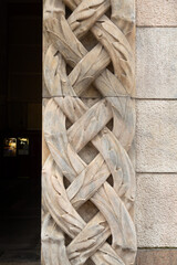 Detail from the ornaments on an Italian building built during the fascist era