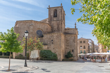 View at the San Juan Bautista church on San Juan Bautista square, tourist people strolling and...