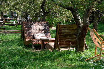 Wooden armchairs and a table