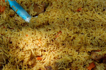 Pilaf cooked in a cauldron