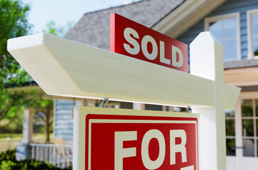 Sold For Sale Real Estate Sign In Front of House. No property release needed - this is a 3D...