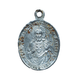 Catholic medal on white.