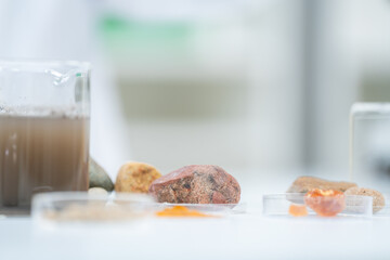 Geology science laboratory research concept, sample test analysis of nature dirtied ground in environment and ecology experiment, agriculture agronomy material to working with scientific equipment