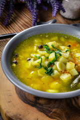 Barley soup with vegetables and chicken.