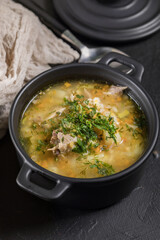 Barley soup with vegetables and chicken.