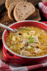 Barley soup with vegetables and chicken.