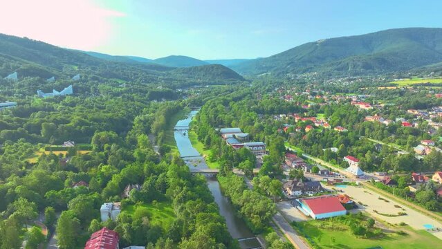 e Vistula river flowing through Ustroń and the view from the drone. Sunny summer day.