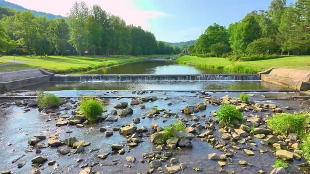 e Vistula river flowing through Ustroń and the view from the drone. Sunny summer day.