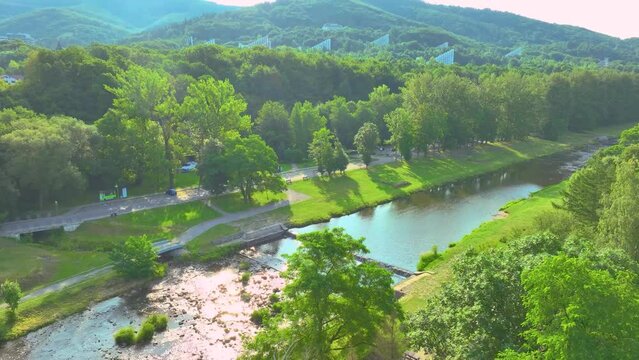 e Vistula river flowing through Ustroń and the view from the drone. Sunny summer day.