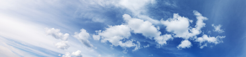 Cloudscape on the blue sky in sunny day in summer.