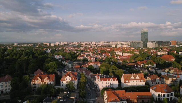 Aerial view of Gdansk. Flight over Oliwa district during sunny evening. Poland.