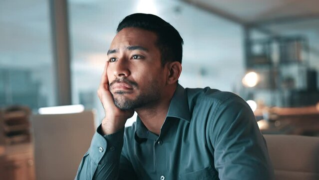 Business man, tired and planning on computer with night fatigue, time management or mental health risk. Professional person with depression, sleeping or sad for online deadline or reading on desktop