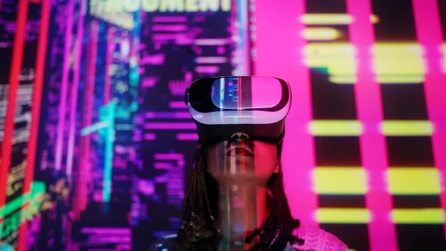 African American woman experiencing VR in a headset, neon-lit futuristic city