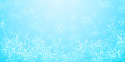 Christmas background of beautiful complex snowflakes in light blue colors. Winter illustration with falling snow