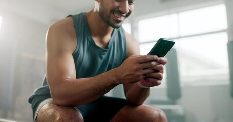 Gym, typing and a man with a phone in hands for fitness motivation, message or internet connection. Happy athlete person with smartphone and network for exercise app, communication or social media - Powered by Adobe