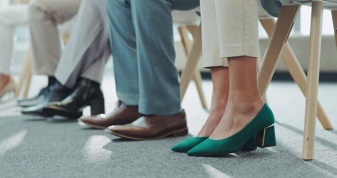 Nervous, anxiety and feet of business person with stress in a hiring or job interview waiting room for recruitment. Closeup, legs and professional or corporate people in a queue for an opportunity