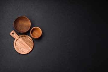 Empty round kitchen wooden cutting board in brown color