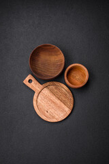 Empty round kitchen wooden cutting board in brown color