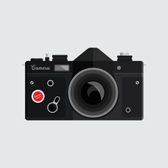 Retro black film camera isolated on white background