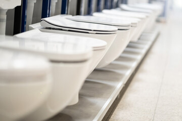 bathroom design - selection of toilet - background of white ceramic