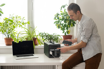 Charging station. Generator power bank battery in the absence of electricity. Charging for phone,...