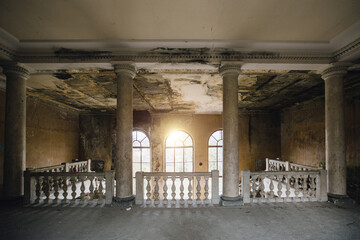 Large entrance hall with columns in old abandoned mansion, Sanatorium Imereti, Tskaltubo