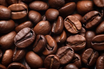 Abundance of fresh and healthy coffee beans background texture