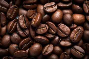 Fototapeta premium Abundance of fresh and healthy coffee beans background texture